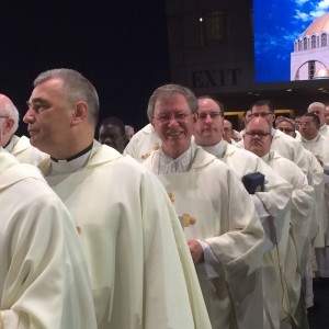 Fr. Mario processing into Mass